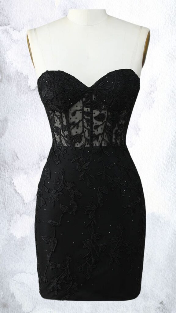 This black mini dress features a fitted silhouette with intricate bead and rhinestone embellishments along the floral embroidery. It has a sweetheart neckline and no sleeves, with a mid-thigh length hemline that highlights a smooth, tailored waist. The sheer mesh detailing adds depth, enhancing the overall elegant appearance of the dress.