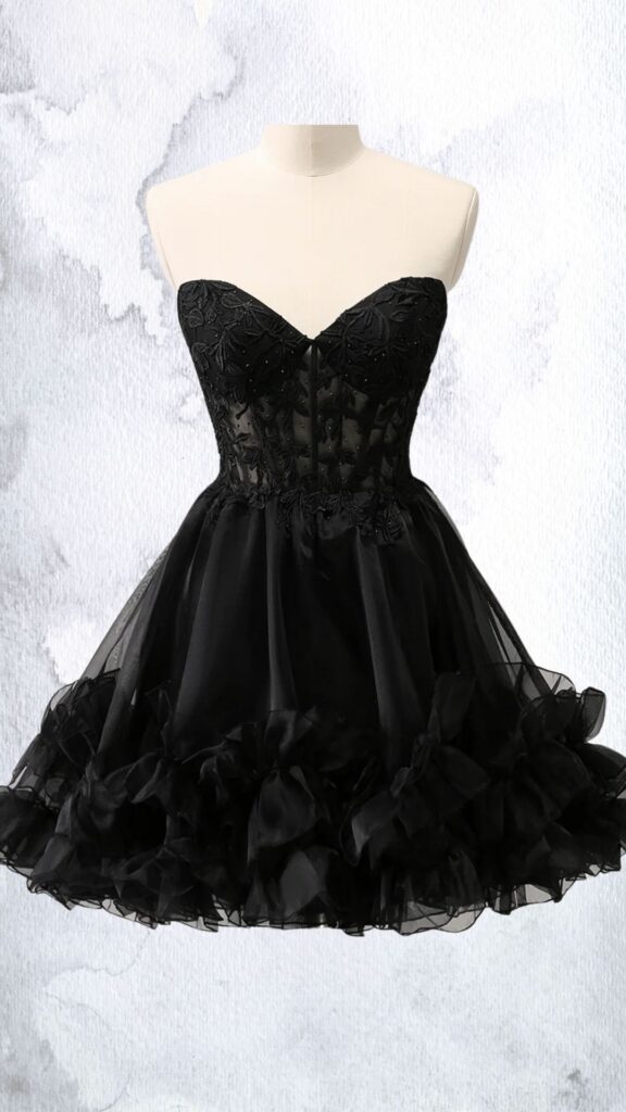 This black mini dress features a fitted, strapless bodice adorned with intricate bead and floral embroidery, transitioning into a flared skirt with multiple layers of ruffled tulle. The design showcases a sweetheart neckline and a voluminous hemline that adds a playful touch, while the embellished details enhance its elegant appeal.