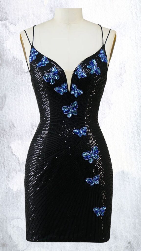 The dress features a form-fitting silhouette crafted from black fabric, embellished with sparkling blue sequins arranged in the shape of butterflies, adding a whimsical touch. It has a deep V-neckline with thin spaghetti straps, a sleeveless design, and a short hemline, enhancing its modern and chic appeal. The intricate details create a shimmering effect, making it ideal for evening wear or special occasions.