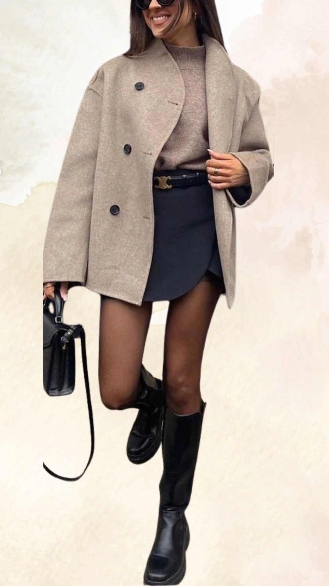The outfit features a cozy, light brown oversized wool coat with a double-breasted design, complemented by a fitted beige sweater underneath. A tailored black mini skirt enhances the silhouette, while she pairs the look with sleek black knee-high boots, creating a chic and modern fall ensemble. The combination of neutral tones and structured elements adds sophistication to this casual fall outfit.
