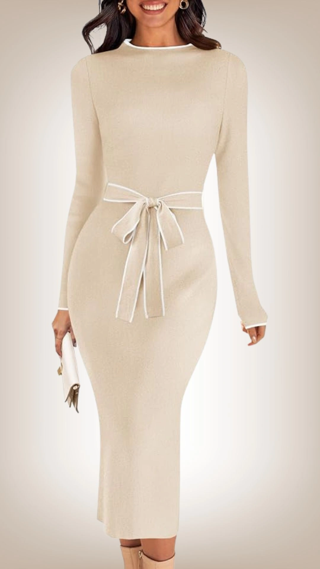 This fitted sweater dress in a soft beige features a round neckline and long sleeves, accentuated by a contrasting white tie belt that cinches the waist. The sleek, body-hugging silhouette seamlessly transitions into a midi-length hem, highlighting curves while providing a polished look. The texture is smooth and soft, ideal for comfort and style during cooler seasons.