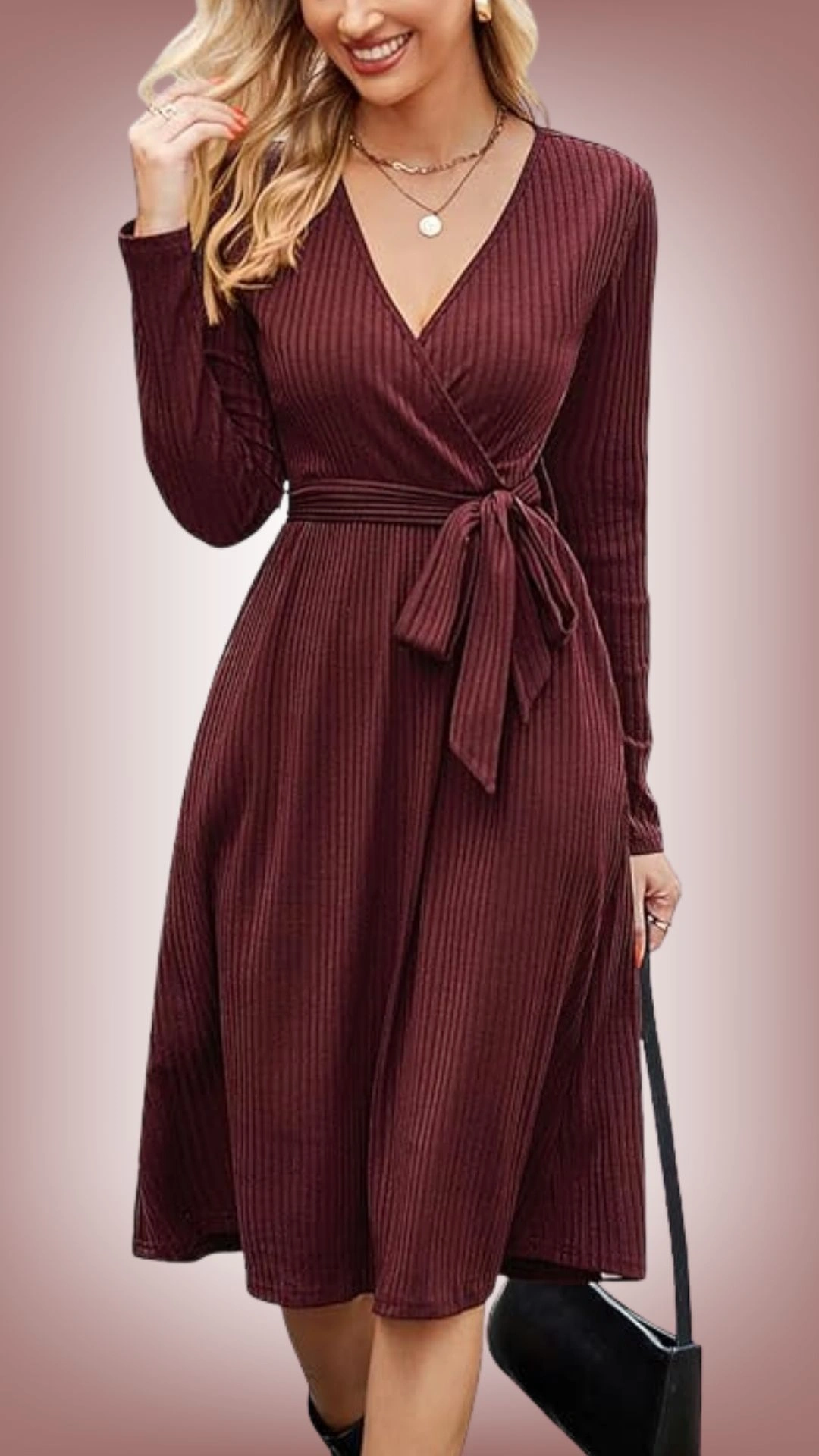 This sweater dress features a deep V-neckline and long sleeves, crafted from ribbed knit fabric in a rich burgundy shade. It cinches at the waist with a tied belt, creating an hourglass silhouette and flowing into a flattering A-line skirt that hits mid-calf. The textured pattern adds subtle depth, making it a versatile piece for both casual and dressed-up occasions.